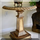 F19. Round pedestal table. 26”h x 24”w